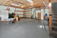 an empty garage before the placement of dehumdifier