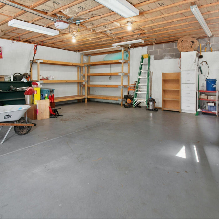 an empty garage before the placement of dehumdifier