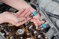 clean fuel injectors in an ultrasonic cleaner